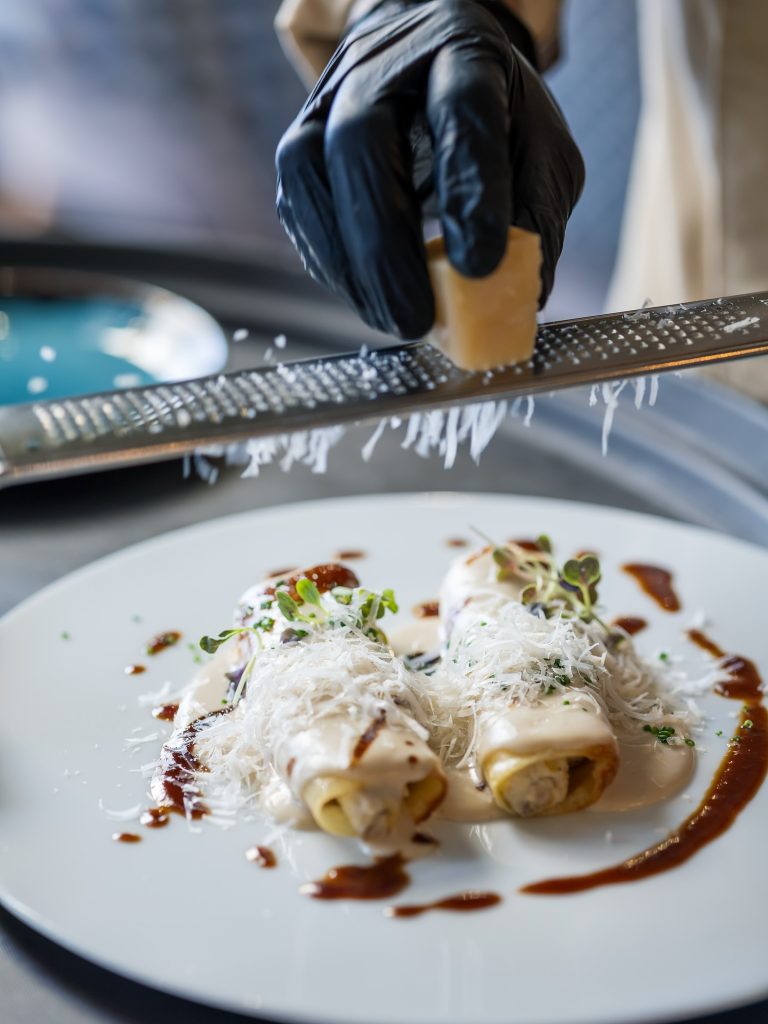 Canelón de puerro, papada y ricotta